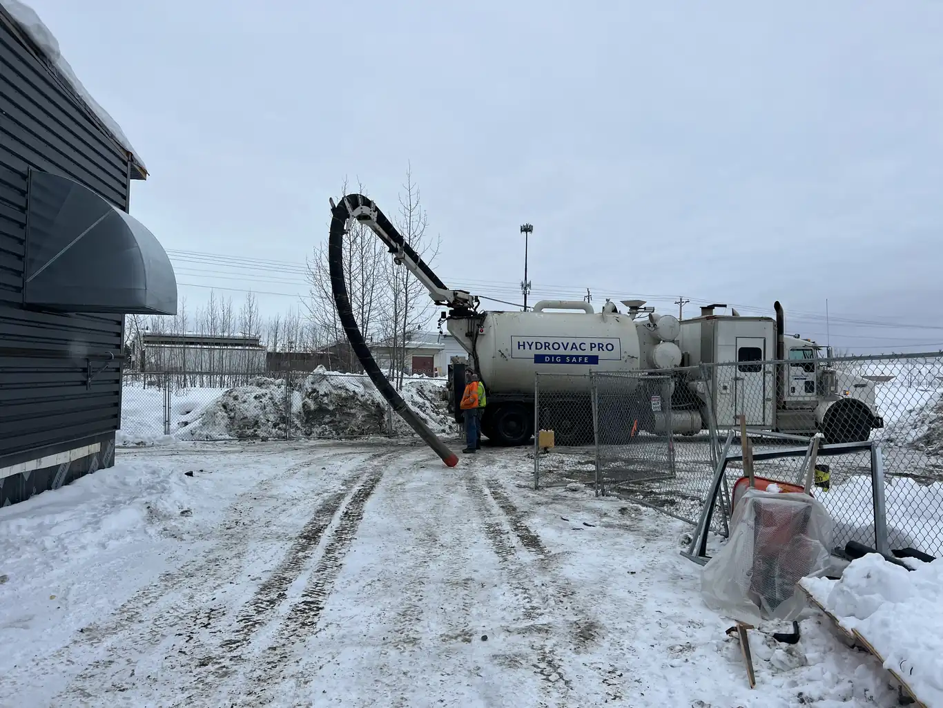 Hydrovac Pro boom excavating on an Alaska job site